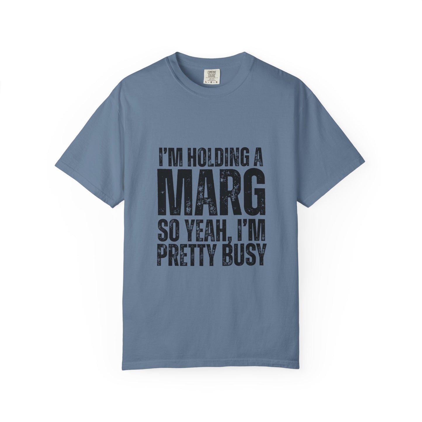 Blue t-shirt with black text reading 'I'm holding a marg so yeah, I'm pretty busy'