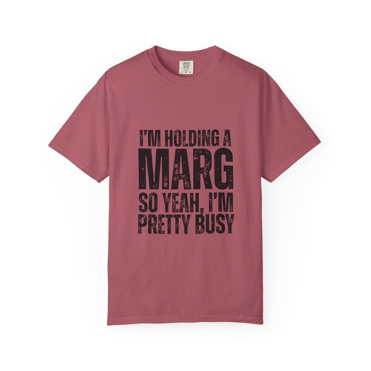 Pink t-shirt with black text reading 'I'm holding a marg so yeah, I'm pretty busy'