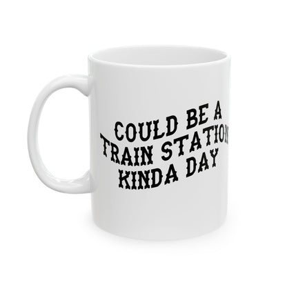 White mug with black text 'COULD BE A TRAIN STATION KINDA DAY' on a white background