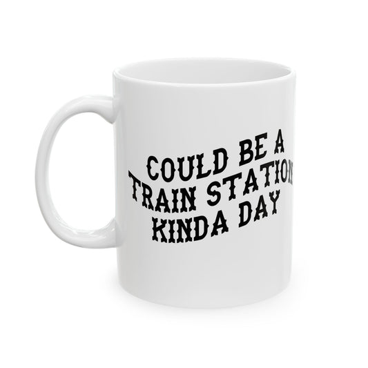 White mug with black text 'COULD BE A TRAIN STATION KINDA DAY' on a white background