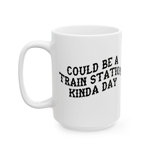 White mug with black text 'COULD BE A TRAIN STATION KINDA DAY' on a white background