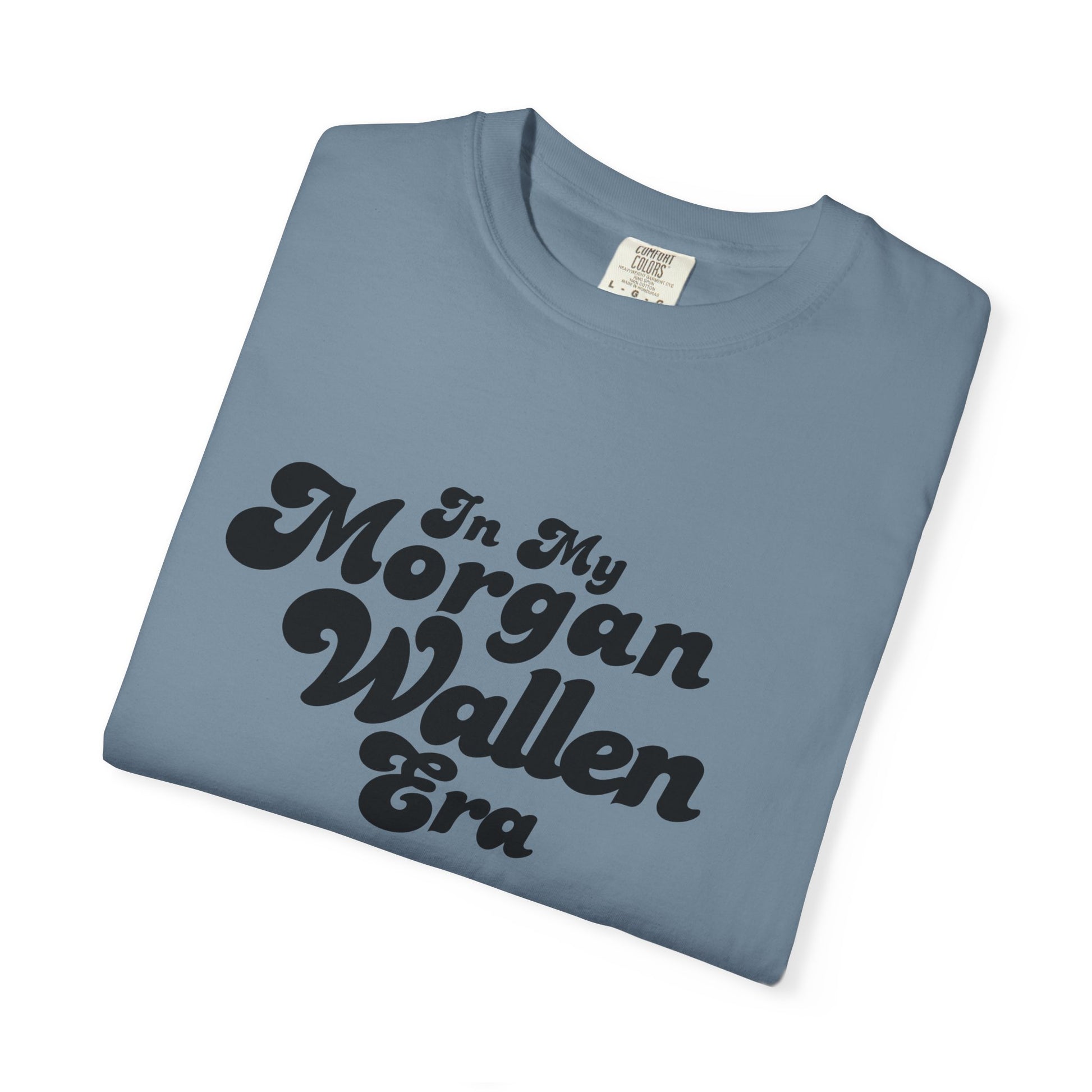 Folded blue t-shirt with black text 