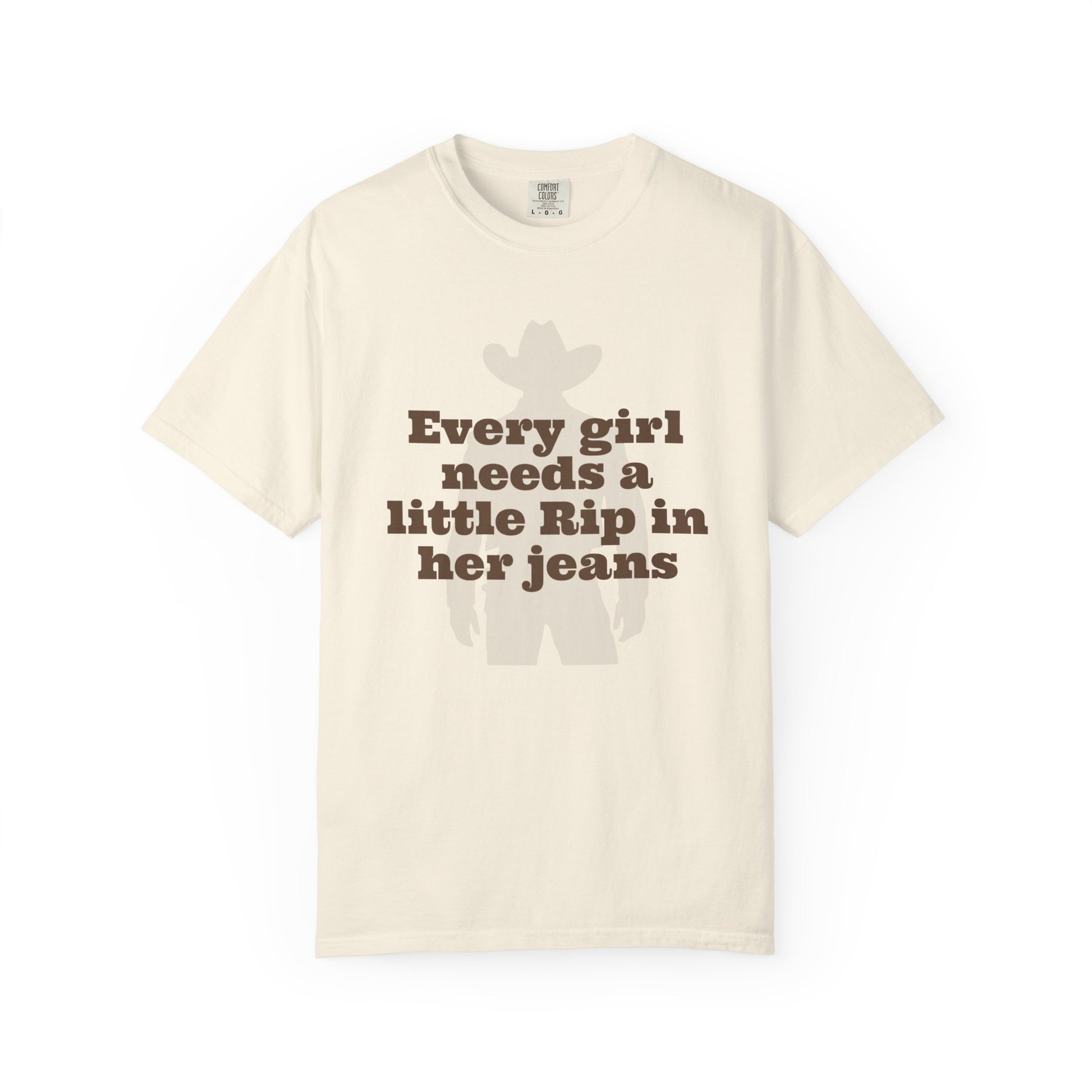Beige t-shirt with text 'Every girl needs a little Rip in her jeans' on a white background
