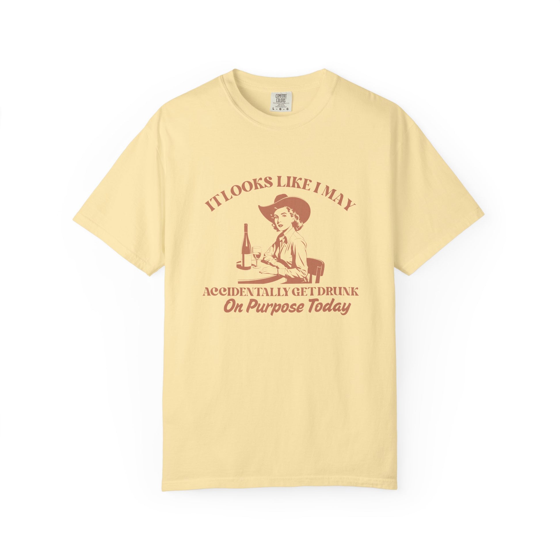 Yellow shirt with a cowgirl and text that says 'It looks like I may accidentally get drunk on purpose today' 