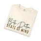 Folded cream-colored t-shirt with 'Beth Dutton State of Mind' text on a white background