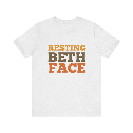 Light grey t-shirt with 'RESTING BETH FACE' text in orange and brown on a white background
