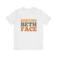 Light grey t-shirt with 'RESTING BETH FACE' text in orange and brown on a white background