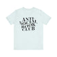 Light blue t-shirt with 'Anti-Social Book Club' text on a white background