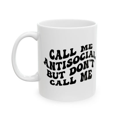 White mug with 'call me Antisocial but don't call me' in black text on a white background