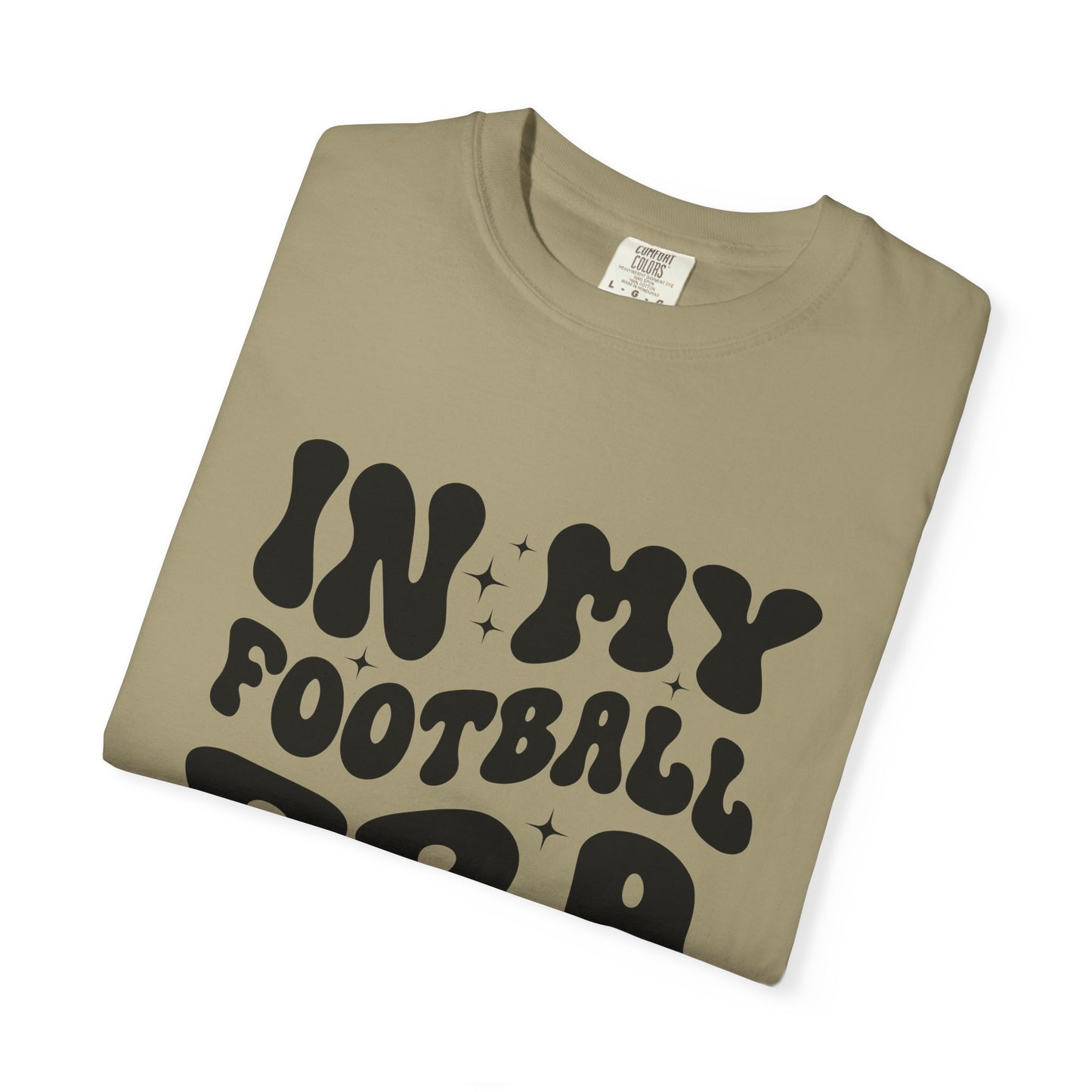 Folded khaki t-shirt with black text on a white background
