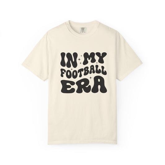 Beige t-shirt with 'IN MY FOOTBALL ERA' text on a white background