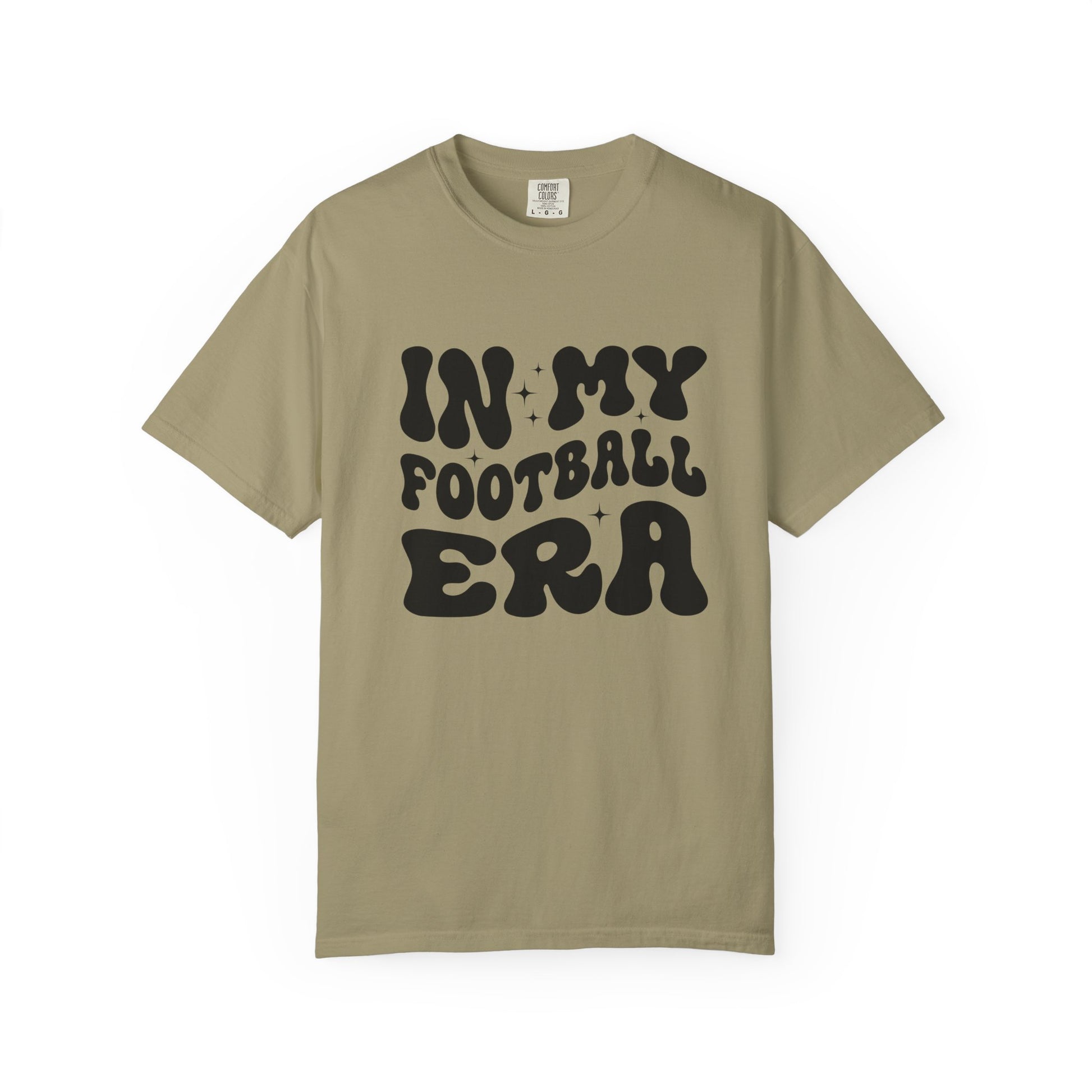 Beige t-shirt with 'IN MY FOOTBALL ERA' text on a white background