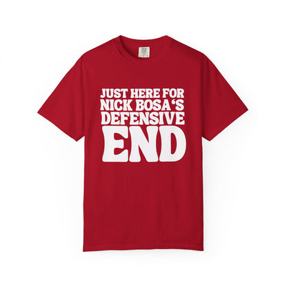 Red t-shirt with white text on a white background