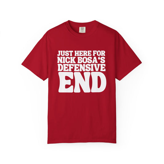 Red t-shirt with white text on a white background