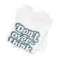folded white tee with 'Don't over think' text on a white background