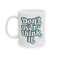White mug with 'Don't overthink it' text on a white background