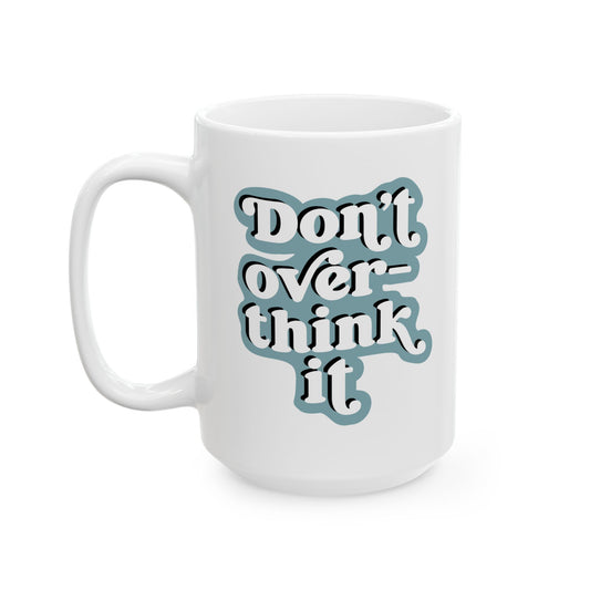 White mug with 'Don't over think it' text on a white background