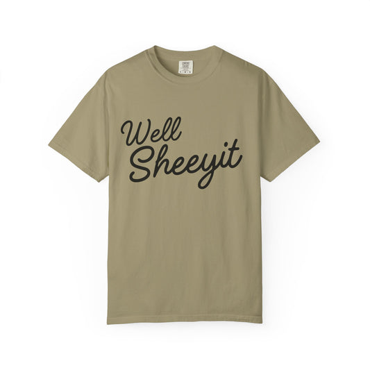 Light brown t-shirt with black text 'Well Sheeyit' 